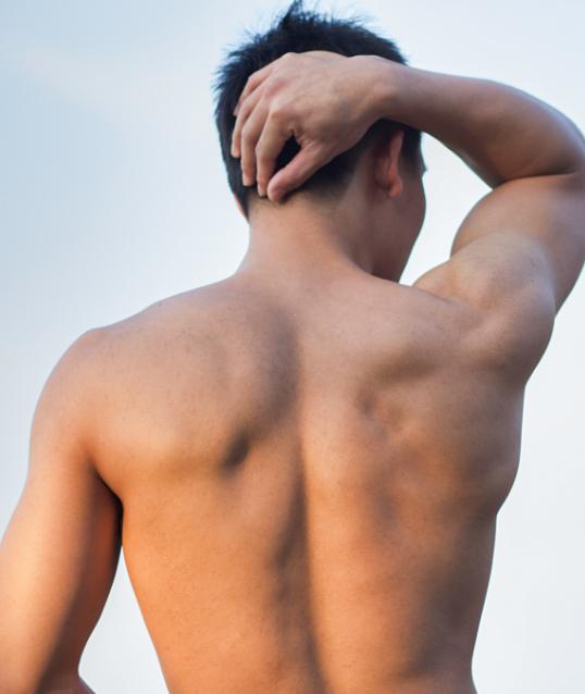 Man's muscular back after body lift
