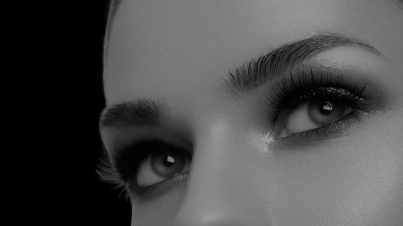 Closeup of a woman's eyes after temple lift