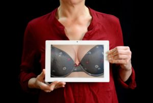 Woman after surgery for breast implants in Chicago. 